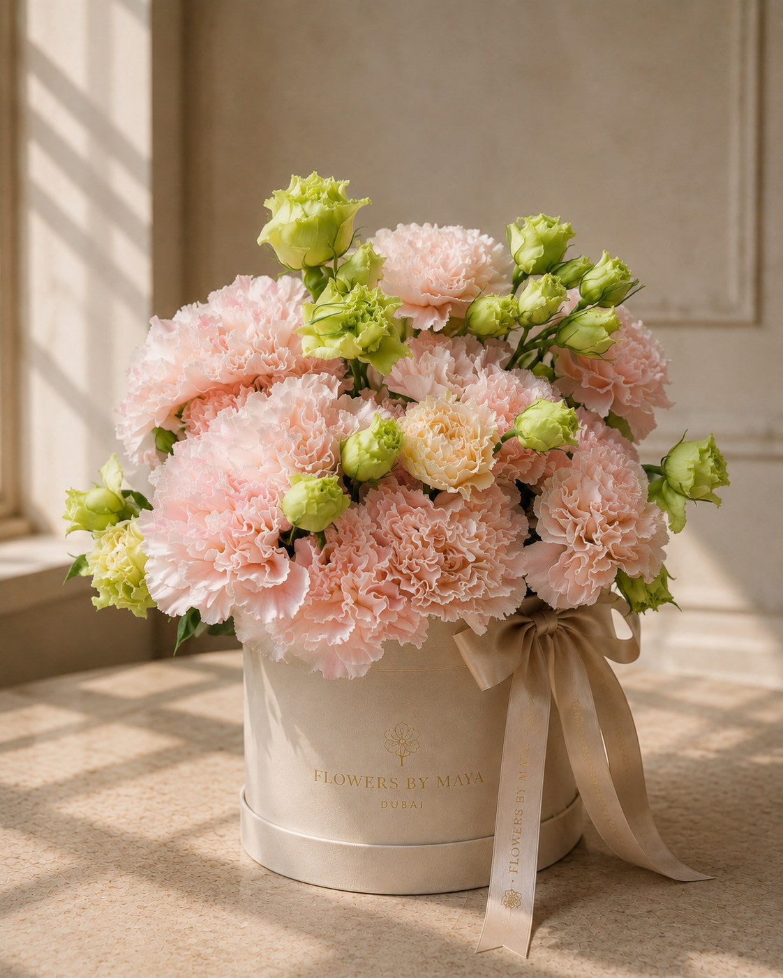 Blush Carnation and Green Lisianthus Hat Box by Flowers By Maya, pale pink carnations with lime lisianthus in a cream suede hat box